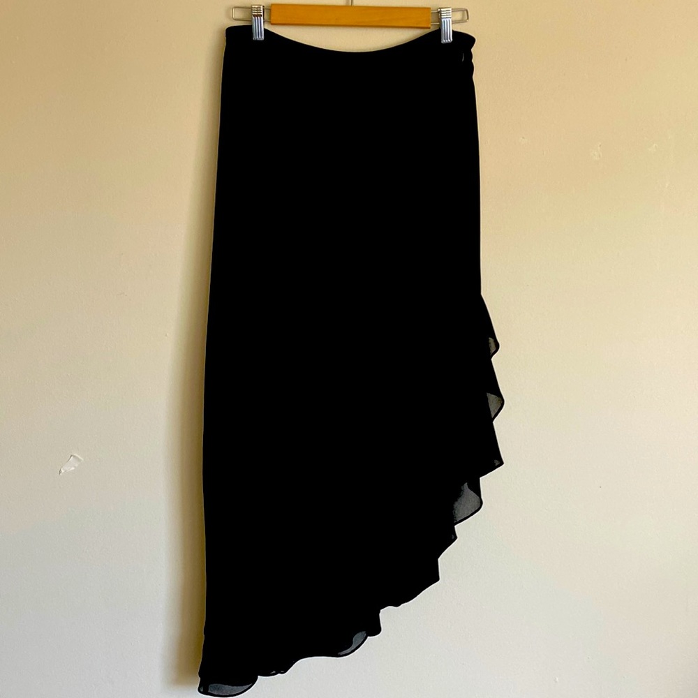 Crepe Asymmetrical black skirt with ruffle edge.  Size 10 Just lovely on!